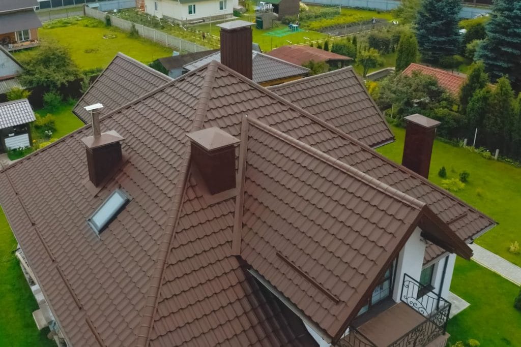 aerial view of brown metallic tiles roof